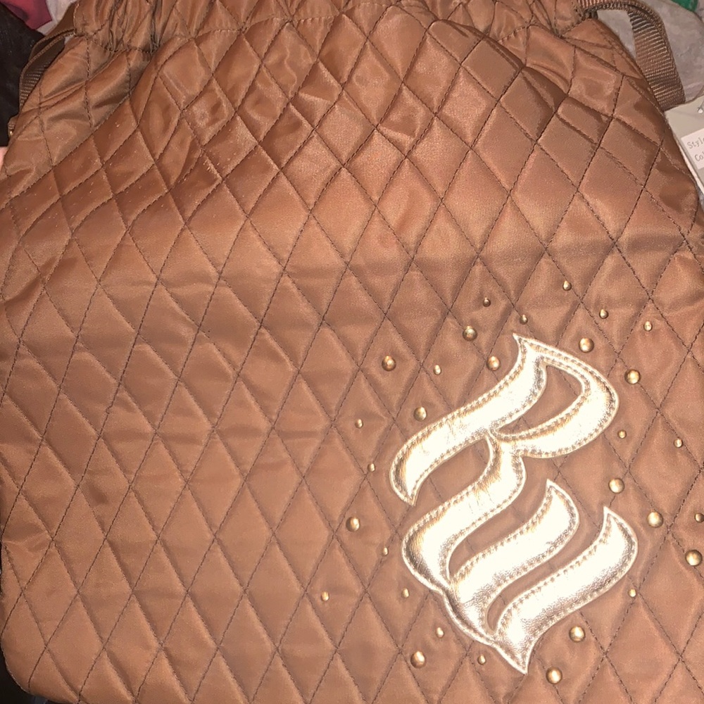 Tan back pack (new)